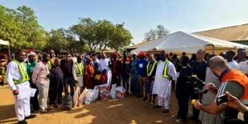 Archbishop Kaigama Donates Relief Materials To IDP Camp