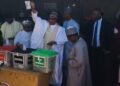 Buhari Votes In Daura, Displays Ballot Paper