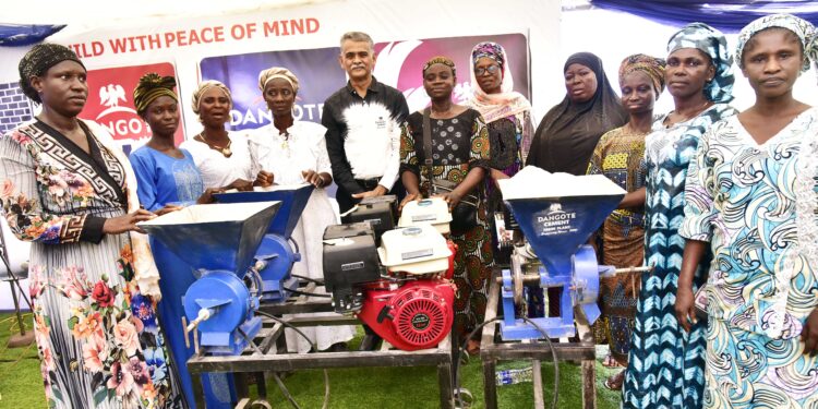 Dangote Cement Ibese, Distributes Laptops, Grinding Machines In Host Communities